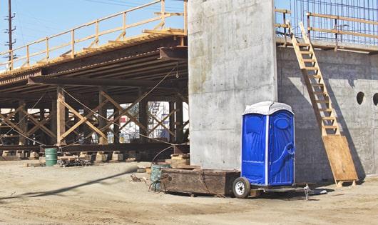 ensure proper sanitation on a construction site with readily available porta potties